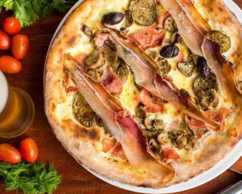 assorted-meat-pizza-with-jamon-olives_501050-925